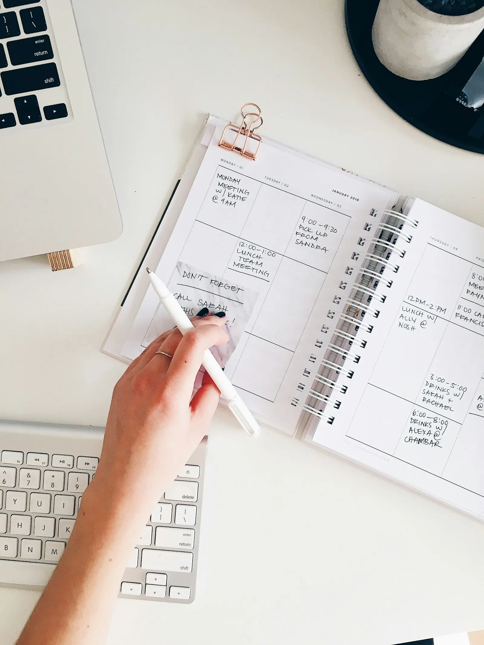 Self-employed worker organizing receipts and a tax deduction list at a kitchen table